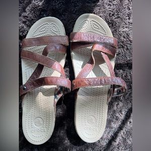 Size 9 never worn Crocs sandals brown smoke free home.